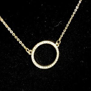 Reversible silver necklace.